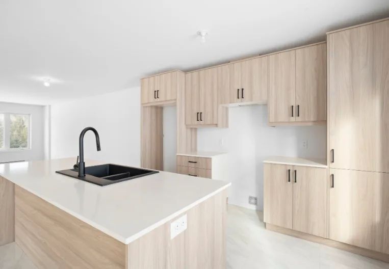 Natural Wood Kitchen with Floor-to-Ceiling Cabinetry
