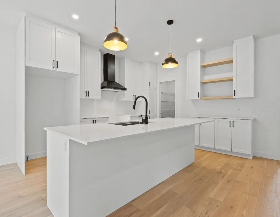 Bright White Kitchen with Open Shelving and Pendant Lighting